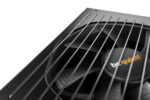 A close-up shot of the be quiet STRAIGHT POWER 12 1500W Power Supply's fan, with the brand's logo visible in the background.